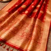 Full pallu design of red gold Banarasi bridal saree with intricate zari motifs